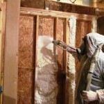 Spraying foam insulation in new construction