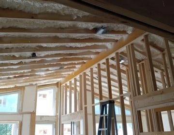 Whole-home spray foam insulation installation sealing walls and ceilings for maximum energy efficiency