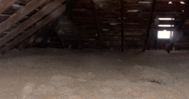 Blown-in attic insulation in a Michigan home