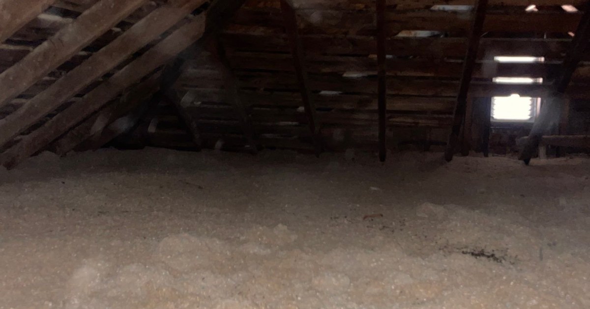 Blown-in attic insulation in a Michigan home