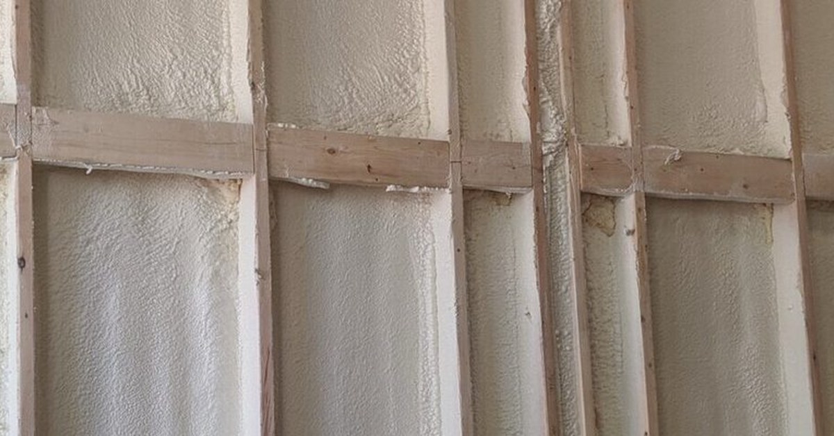 Closed-cell spray foam on a pole barn wall