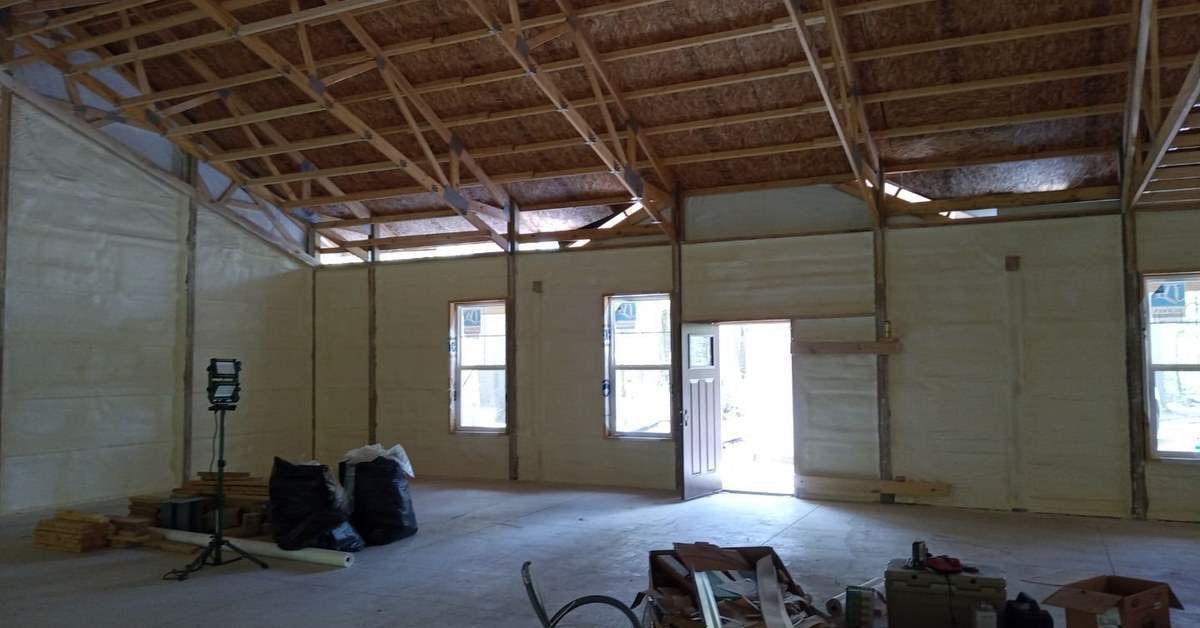 Closed-cell spray foam sealing a wall