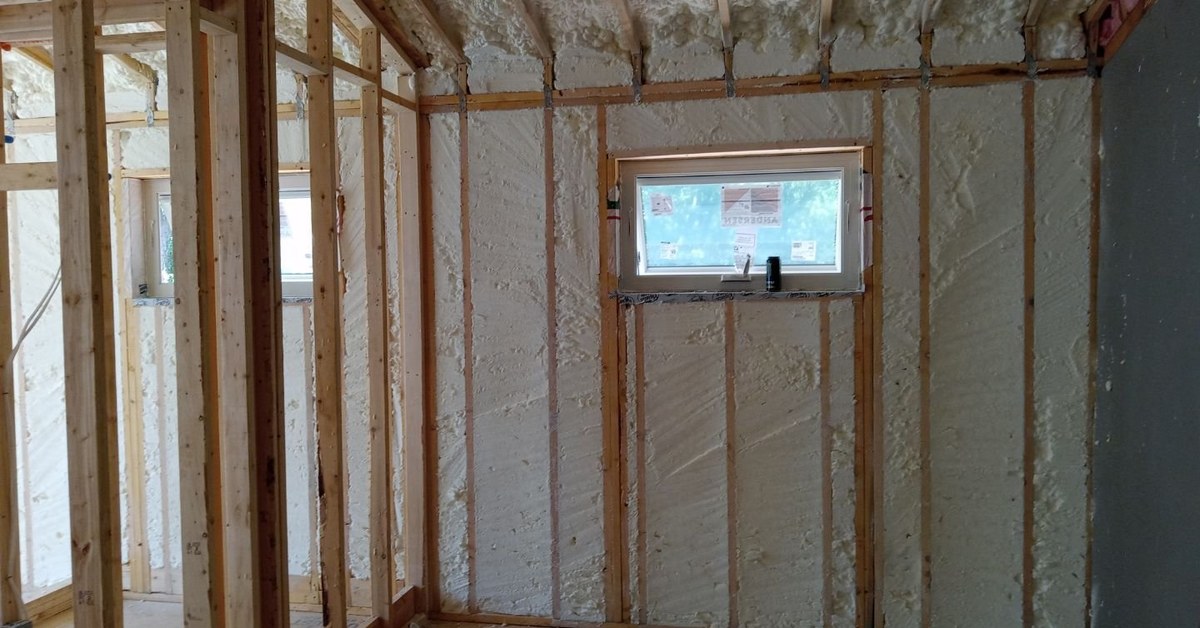 Walls insulated with closed-cell spray foam
