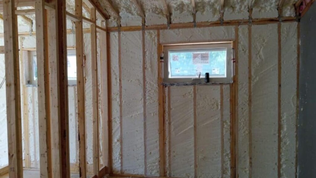 Spray foam insulation improving commercial wall efficiency