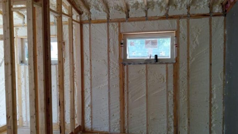 Spray foam insulation improving commercial building wall efficiency